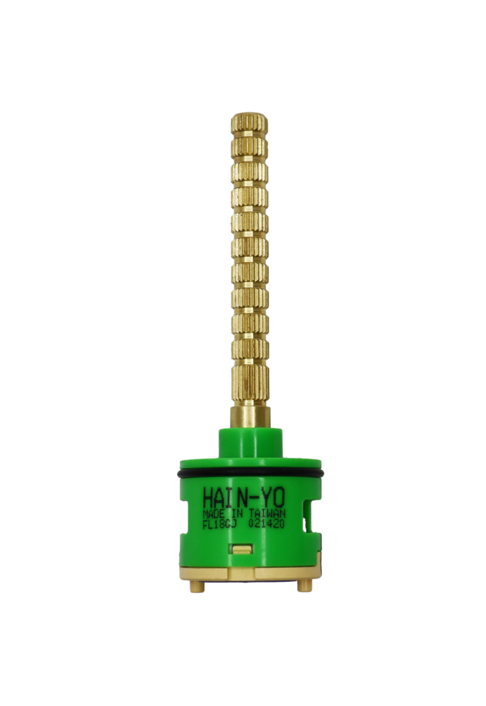 Lime green plasti cartridge with brass handle connection black rubber o-ring tan bottom with blue rubber seals.