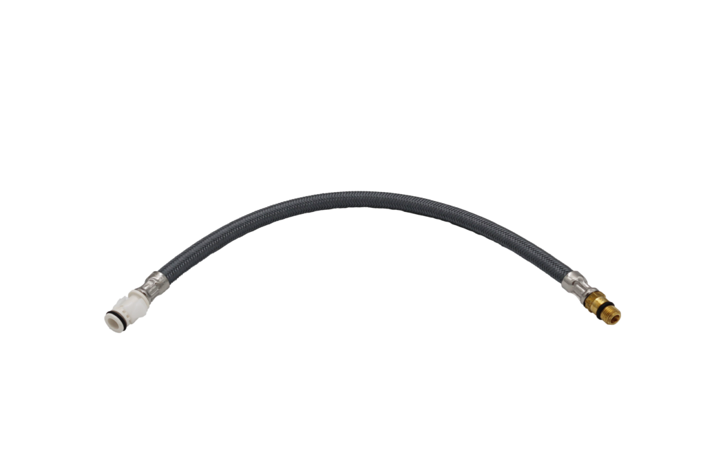 Braided supply hose with white plastic fitting brass faucet connection with black o-rings.