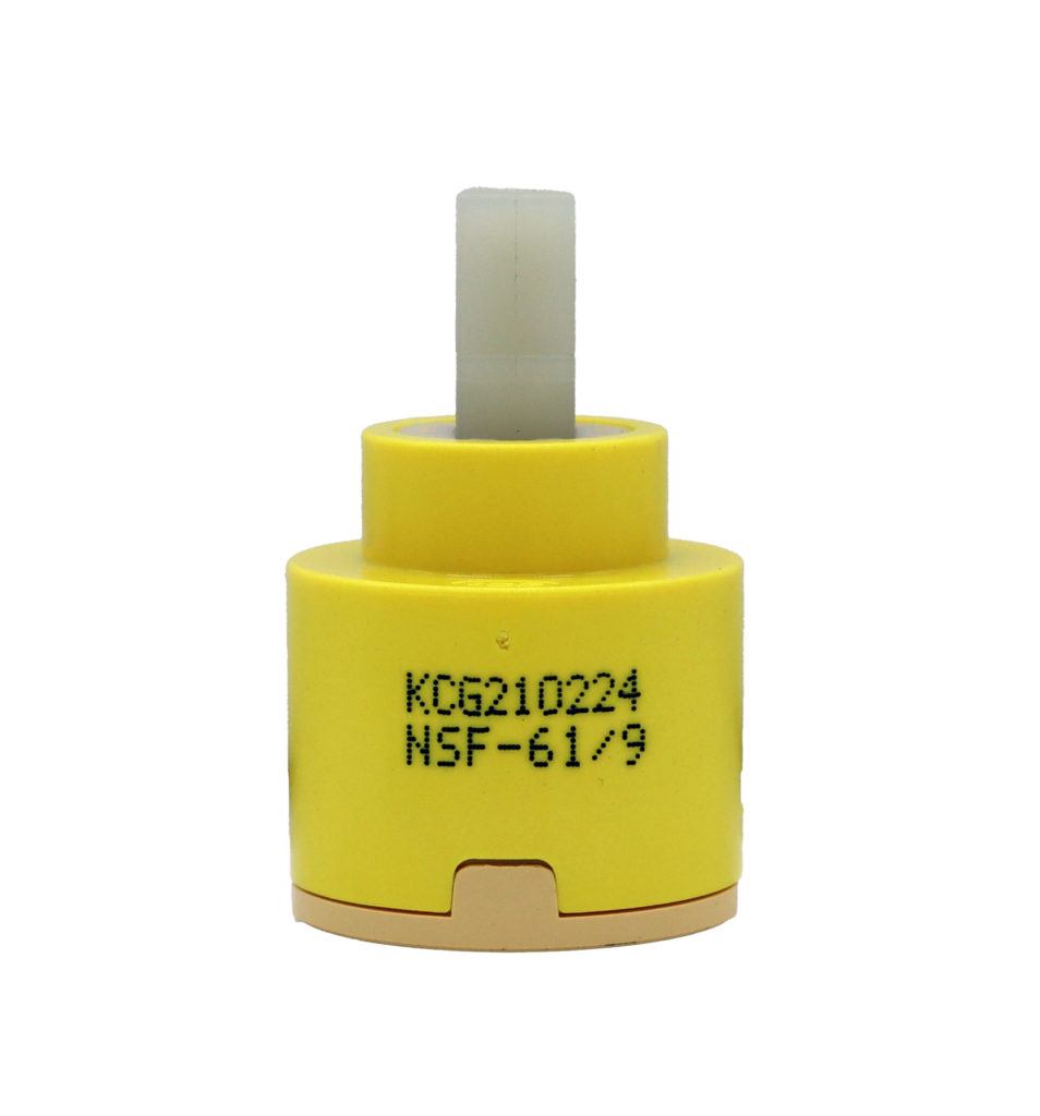 Bright yellow plastic cartridge with white square handle connection with tan bottom and white rubber seal.