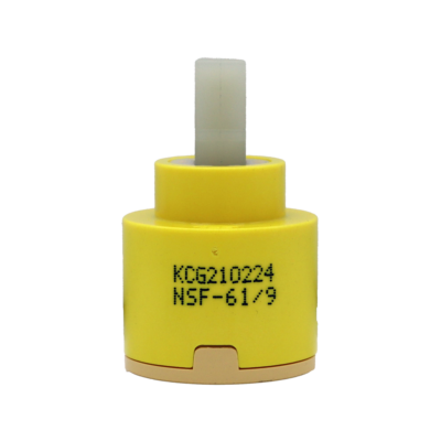 Bright yellow plastic cartridge with white square handle connection with tan bottom and white rubber seal.
