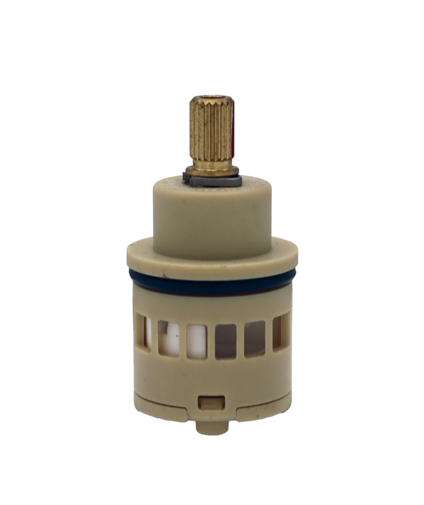 Tan plastic cartridge with black rubber o-ring brass stem with metal clip white ceramic discs and black rubber seals.