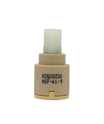 Tan plastic cartridge with white square handle connection with blue rubber seal.