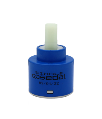 Blue and white plastic cartridge with square hande connection with blue rubber bottom seals.