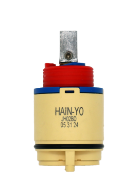 Tan plastic cartridge with blue top red limit stop metal handle adapter with black oring and bottom seal.