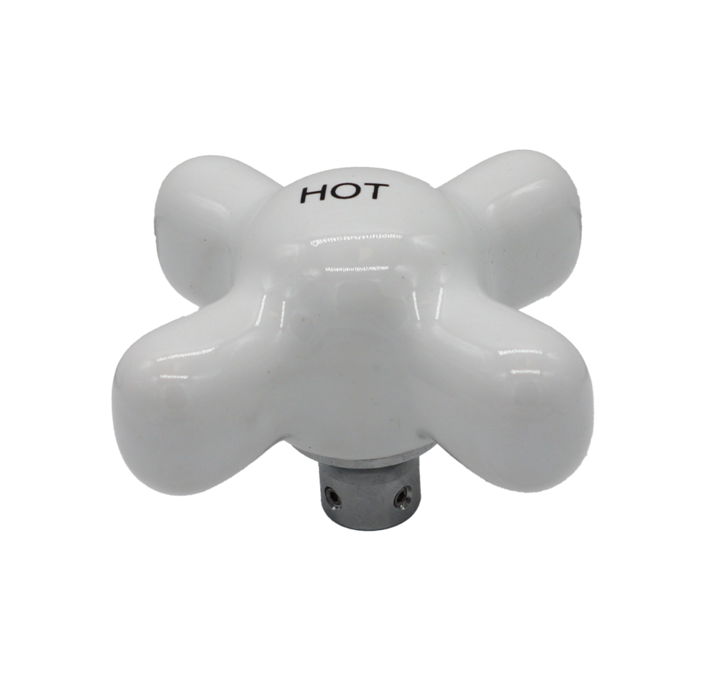 Bright white porecelain x cross handle with metal broach.