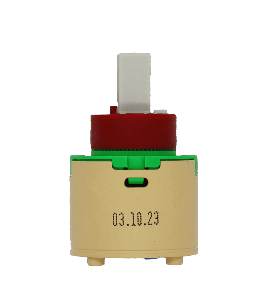 Tan plastic cartridge with green top red limit stop white square handel connection and blue rubber seal.