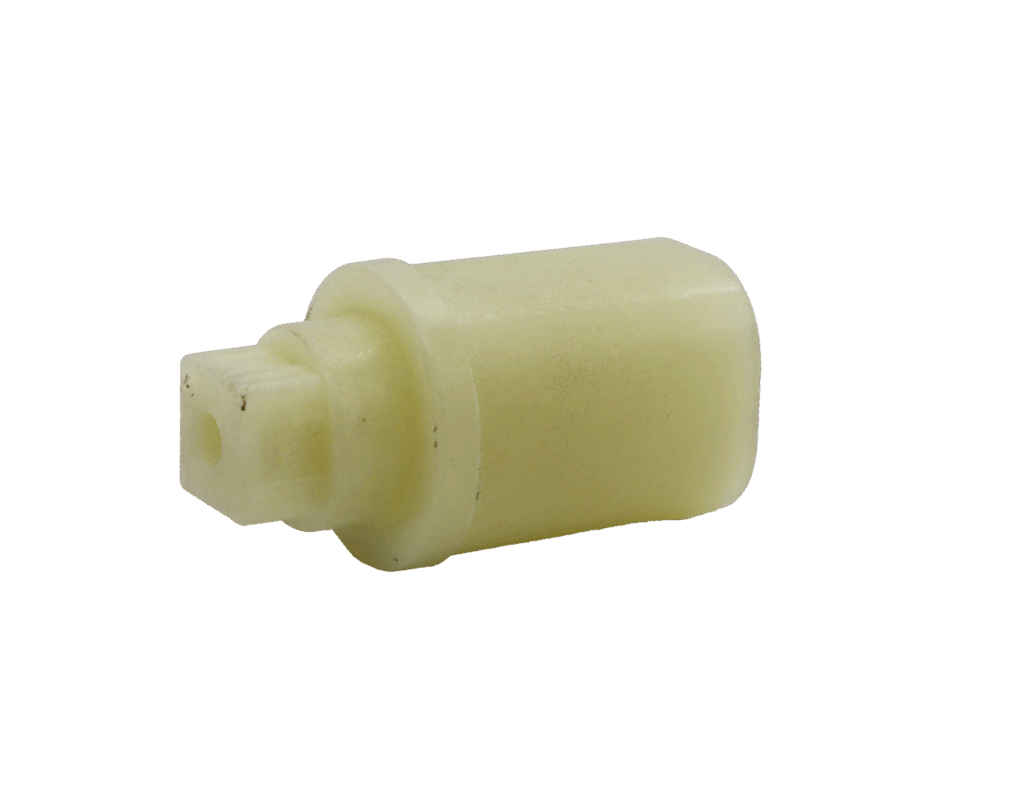 Beige plastic stem driver with square handle connection.