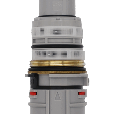 Gray cartridge with a brass center ring with black o-rings and red control tab.