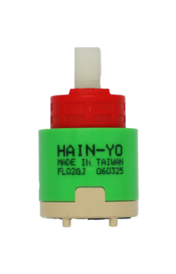 Green and tan plastic cartridge with red limit stop white square handle connection and black rubber seal.