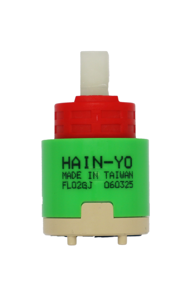 Green and tan plastic cartridge with red limit stop white square handle connection and black rubber seal.