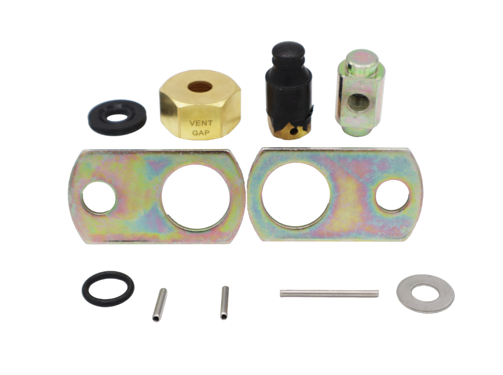 Black rubber seal with brass and metal nuts.