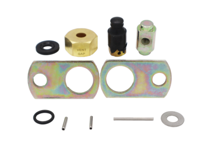 Black rubber seal with brass and metal nuts.