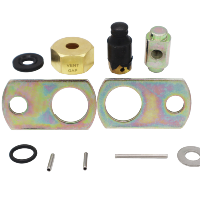 Black rubber seal with brass and metal nuts.