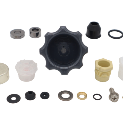 Grey plastic handle black rubber seals white plastic nuts and vacuum breaker with stainless and brass screws.