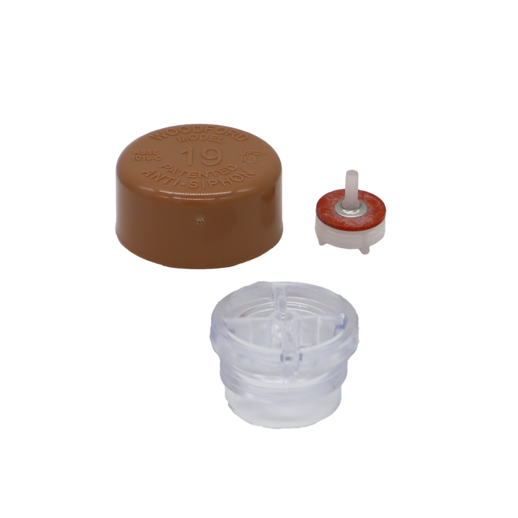 Tan plastic cap with clear plastic vacuum breaker and float with red rubber washer.