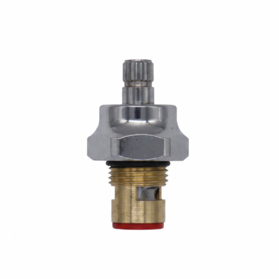 Bright brass cartridge with white ceramic discs red rubber seal black rubber o-ring and polished chrome stem and nut.
