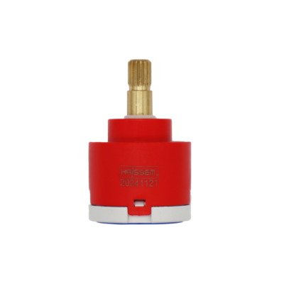 Red and white plastic cartridge with brass stem and blue rubber seal.