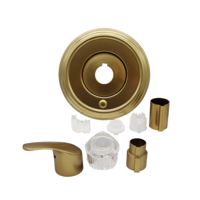 Matte gold handle escutcheon sleeve acyrlic knob and white plastic adapters.
